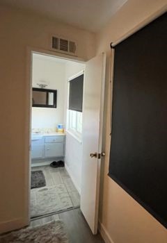 Custom Blackout Roller Shades for Windows in Pasadena Bedroom and Bathroom